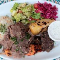 Mediterranean Combo Kebab Plate · Lamb and beef gyros, chicken kebab, shish kebab, and kofte. Served with salad, rice, pita br...