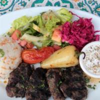 Kofte Plate · Charbroiled ground lamb and beef with fresh herbs. Served with salad, rice, pita bread, and ...