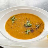 Red Lentil Soup · Red lentil, Turkish pepper paste, dry mint, yellow onion, and olive oil. Served with pita br...