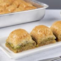 Baklava with Pistachio · Rich sweet dessert pastry made of layers of filo dough filled with pistachio.
