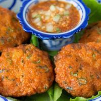 Fish & Curry Cake · Ground fish mixed with a house-made red chili paste, served with chunk cucumber in sweet chi...