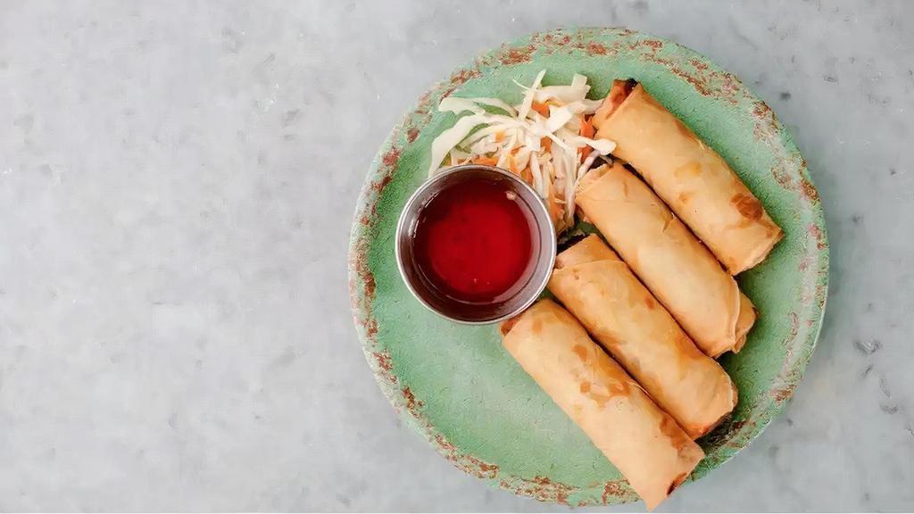 Spring Rolls · Vegetarian. Fried egg rolls served with sweet chili sauce.