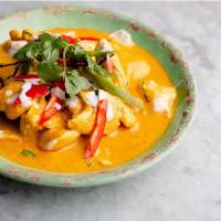 Red Pumpkin Curry · Kabocha pumpkin, red bell pepper, green beans simmered in red curry paste and coconut milk.