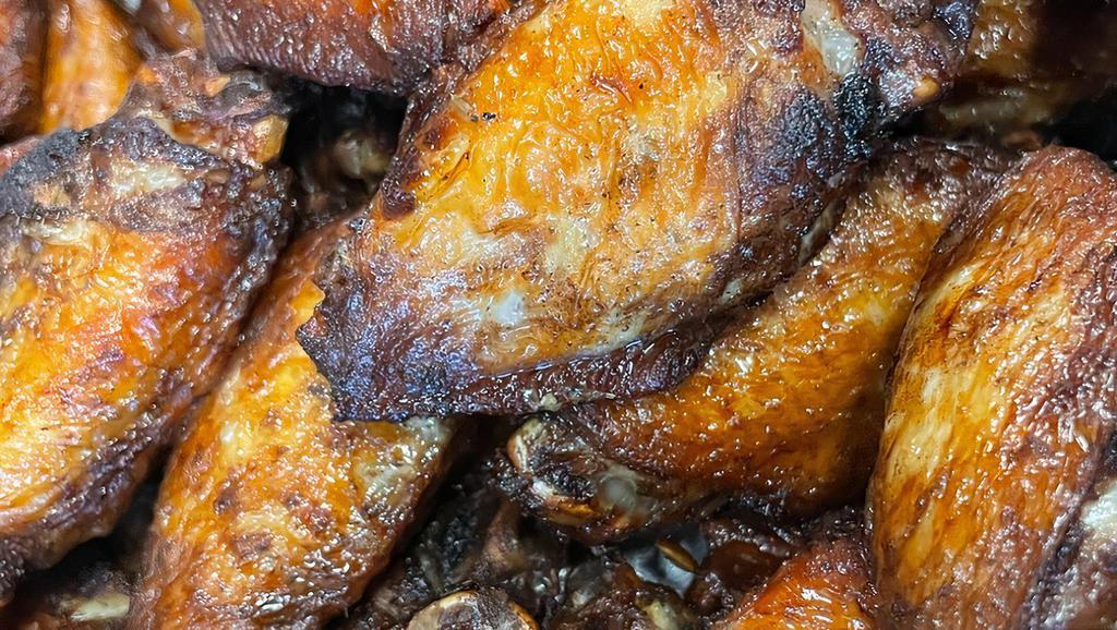 6. Chicken Wings · Deep fried in-house marinade.