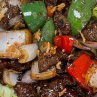 14. Shaken Beef / Bo Luc Lac Salad · Filet mignon. Lettuce, onion, bell pepper, peanuts.
