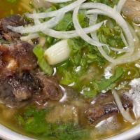 21. Oxtail Pho · Oxtail w/ rice noodles.