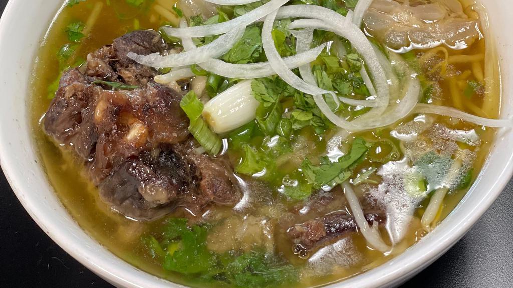 21. Oxtail Pho · Oxtail w/ rice noodles.