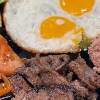 S6. Bo Ne (Vietnamese Steak and Eggs) · Served w/ two sunny side up eggs, pate, tomatoes, cucumber, and baguette.