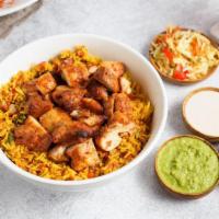 Rice Bowl with Chicken by Oren's Hummus · By Oren's Hummus. Turmeric spiced Basmati rice simmered with tomatoes, garlic, onions, mint,...
