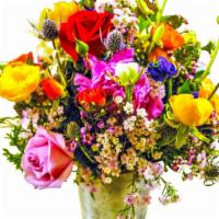 Sweet Colors · Mix bouquet of small flowers in a ceramic container.