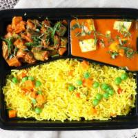 Okra Masala, Paneer Tikka & Biryani Bento · Indian bento box with a Indian cottage cheese tomato based curry, masala okra, and garlic cu...