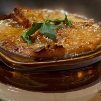 French Onion Soup · Traditional Onion Soup, Emmental cheese, croutons