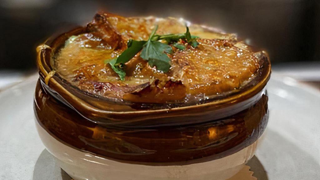 French Onion Soup · Traditional Onion Soup, Emmental cheese, croutons