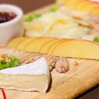 Cheese Plate · Assorted cheeses, homemade strawberry jam