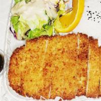 Ton Katsu · Breaded, deep fried pork cutlets with salad and rice.