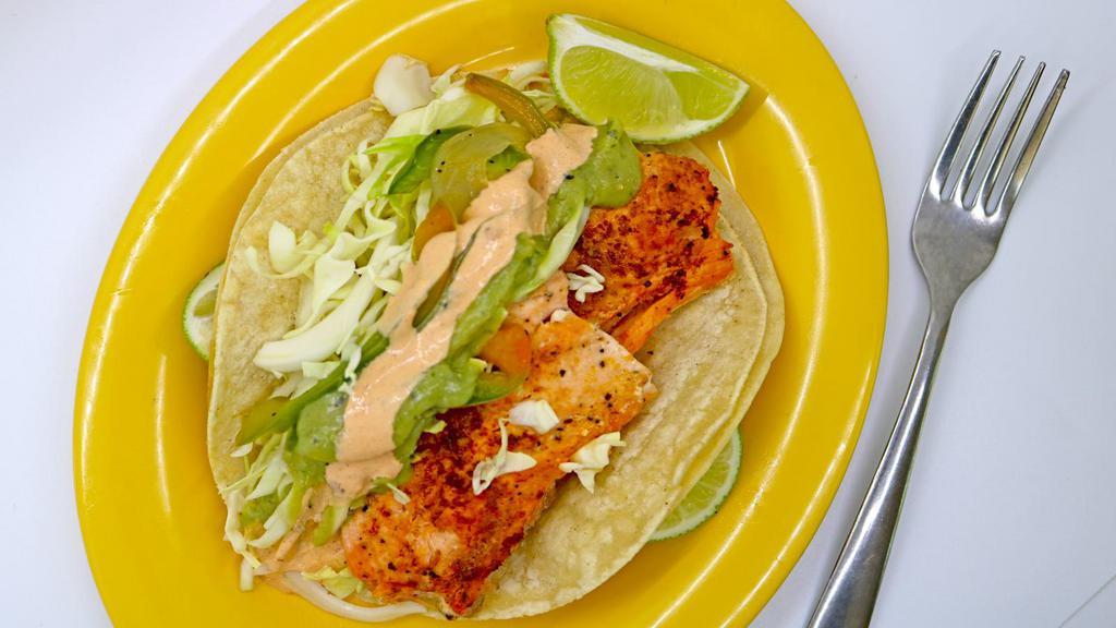 Sí Food Taco · Allergens dairy. Grilled seafood with bell peppers and onions, topped with cabbage, avocado, and chipotle sauce.  Breaded seafood topped with cabbage, pico de gallo, tomatillo, avocado, and chipotle sauce).
