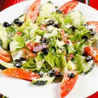 Salad de Casa · Allergens dairy. Mixed greens, pico de gallo, corn, olives, queso cotija.