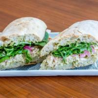Green Tahini Roll (pulled rotisserie chicken, green tahini, spinach & chili) · 