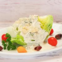 Wedge Salad · with Blue Cheese Dressing or Ranch Dressing.