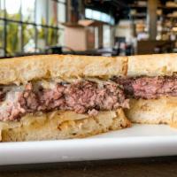 Ultimate Patty Melt · grilled angus beef patty, sweet caramelized onions, melted gruyere, mozzarella, and pub must...