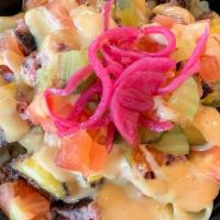 Loaded Cheeseburger Mac · grilled angus beef patty, American cheese, pickled red onion, tomatoes, pickles, signature s...