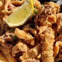 Calamari · Seasoned, deep-fried, hand-cut calamari (rings & tentacles) served with our garlic aioli & F...