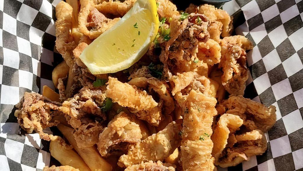 Calamari · Seasoned, deep-fried, hand-cut calamari (rings & tentacles) served with our garlic aioli & French fries