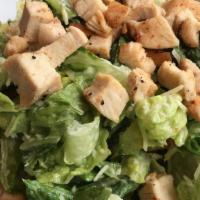 Caesar Salad · Crisp hearts of Romaine with homemade croutons tossed in our own Caesar dressing.