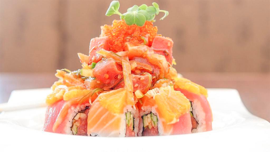 Poke Roll · In: Spicy tuna, cucumber. Out: Tuna, salmon, orange, poke salad, tobiko.
