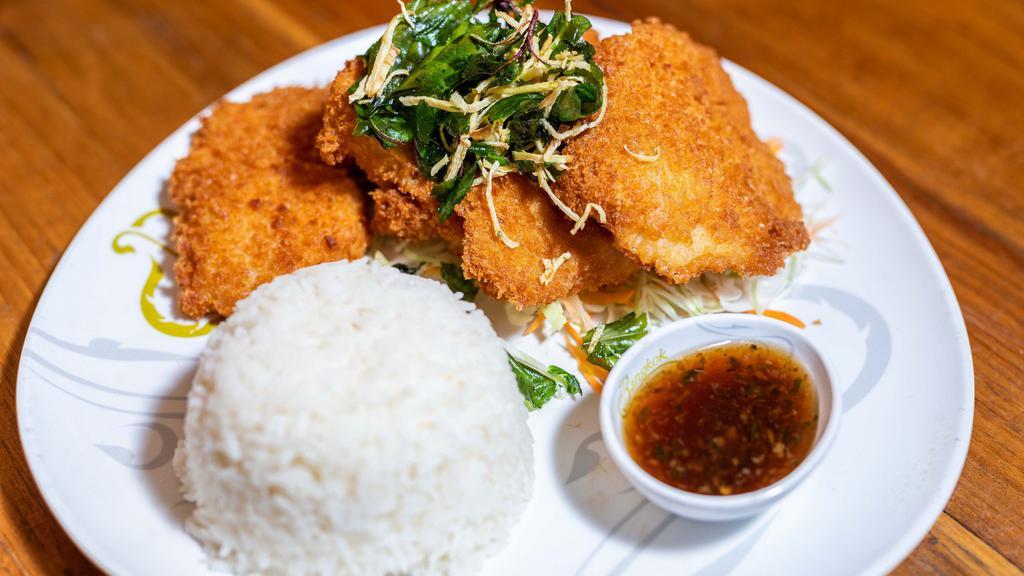 S20. Ginger Garlic Fish · Hand-battered and fried fish topped with crispy basil and ginger. Served with house-made garlic sauce.