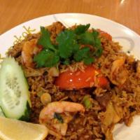 S5. Khao Pad Tom Yum · Stir fried rice with tom yum sauce, milk, shrimp. egg. Baby com, tomato, bell pepper and mus...