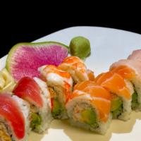 Rainbow · california roll topped with maguro, hamachi, salmon, ebi