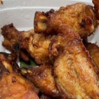 3. Angel Wings · Deboned chicken wings, stuffed with ground pork, and bean thread. Served with plum sauce.