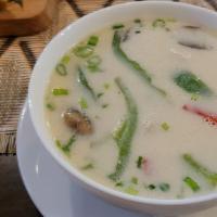 22. Tom Kha · A spicy and sour coconut milk with flavor of galanga, lemongrass, kaffir lime leaves and a c...