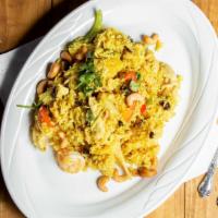 69. Pineapple Fried Rice · Fried rice with chicken, shrimp, pineapple, cashew nuts, raisin, onion and bell pepper.