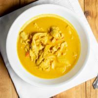 30. Yellow Curry · Chicken and potatoes in yellow curry paste and coconut milk.