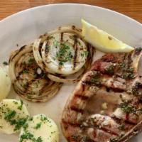 Pork Chops with grilled onions · 