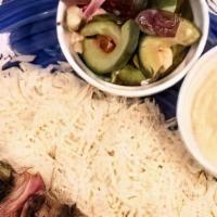 Chicken Kebob 2 Skewer Meal · Served with basmati rice, Greek salad and a side of hummus.