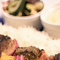 Beef Kebob 2 Skewer Meal · Served with basmati rice, Greek salad and a side of hummus.