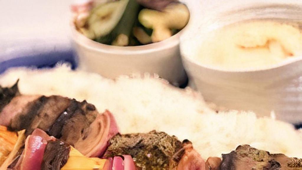 Beef Kebob 2 Skewer Meal · Served with basmati rice, Greek salad and a side of hummus.