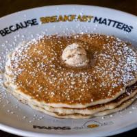 Buttermilk Pancakes · Made fresh every day, Premium ingredients served with whipped butter and hot maple syrup.