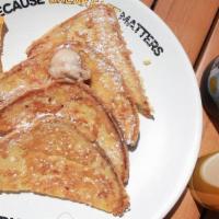 French Toast · Delicious sliced fried bread soaked in beaten eggs and milk.