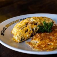 Denver Omelette · Enjoy our Denver Omelette with ham, onions, bell peppers, and Monterrey cheese. Served with ...