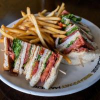 Club Sandwich · Turkey bacon, lettuce, tomato, mayo, and cheese.
