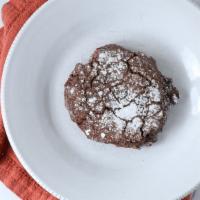Double Chocolate Crackle · Decadent chocolate cocoa with baked chocolate chips, dusted with powdered sugar. Similar tex...