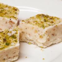 Sheer Payra (3 Pieces) · Afghan version of milk fudge topped with cardamom powder rose water, almonds, and pistachios.