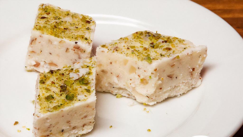 Sheer Payra (3 Pieces) · Afghan version of milk fudge topped with cardamom powder rose water, almonds, and pistachios.