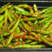 Sambal String Beans · String beans sautéed with fresh chili spices and dried shrimp.