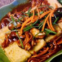 Crispy Tofu · Vegetarian. Crispy tofu topped with thinly sliced fresh shiitake mushrooms, carrots and scal...