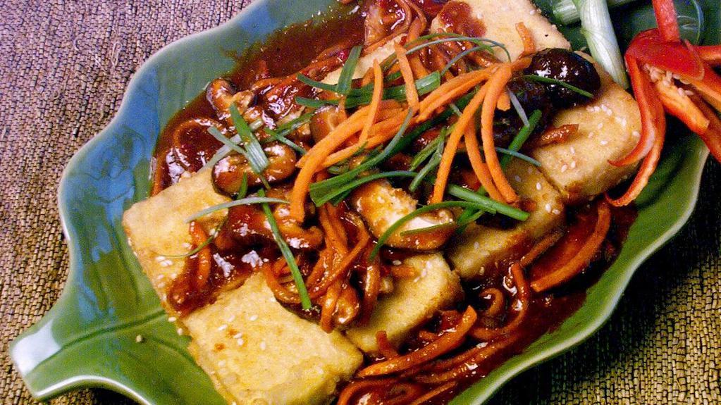Crispy Tofu · Vegetarian. Crispy tofu topped with thinly sliced fresh shiitake mushrooms, carrots and scallion sauce.